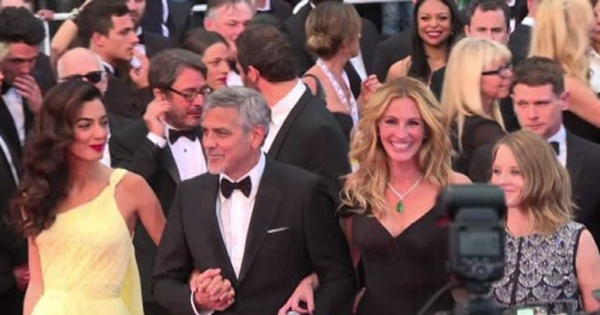 Clooney conteso tra Amal e Julia sul red carpet di Cannes