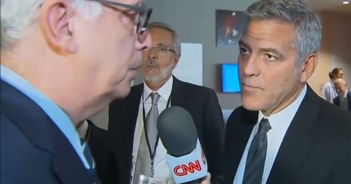 George Clooney scopre in diretta del divorzio dei Brangelina